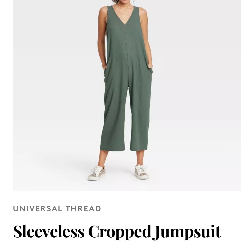 Light grey/cream colored jumpsuit. Fits oversized